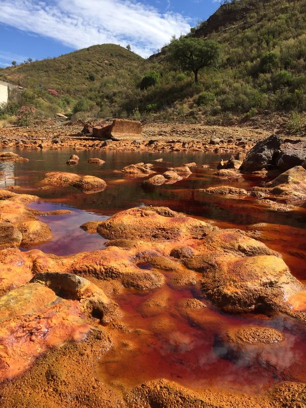 The Rio Tinto – "Red River" – in the Spanish province of Huelva: The bright oranges and reds of the water and sediments are created by various microorganisms.