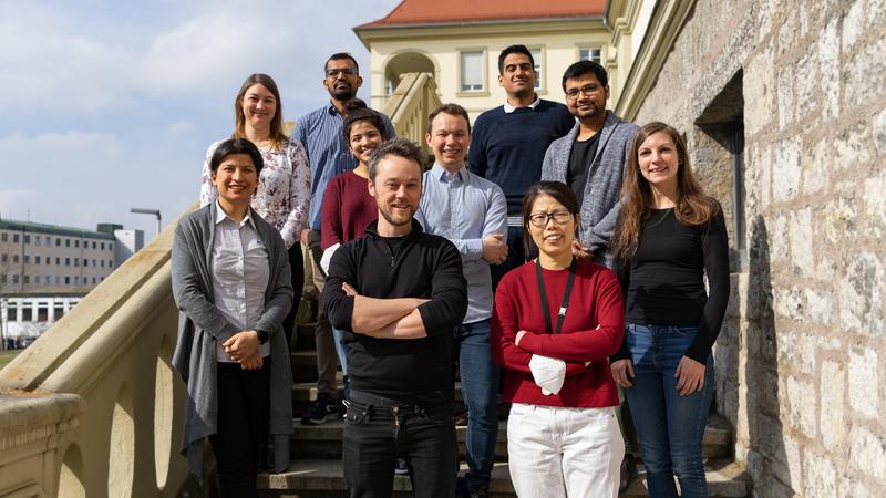 Jun Prof Redmond Smyth, corresponding author, and Liqing Ye, first author (front/center) with HIRI team from the HIV study