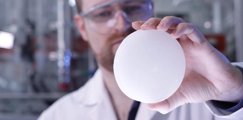 Felix Marske holds a sample of the new material