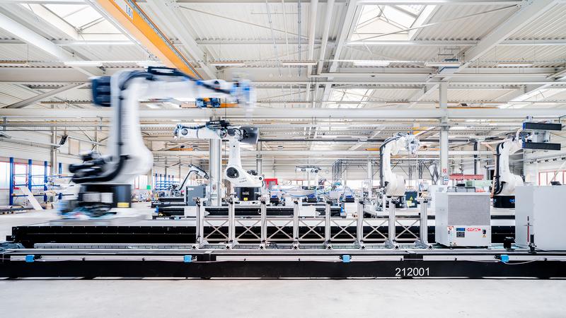 General view of the Large-Scale Construction Robotics Laboratory (LCRL) of the Cluster of Excellence IntCDC at the University of Stuttgart.