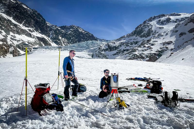 High-tech meets high altitude: Fabian Fleischer and Jakob Rom with laser scanner and GPS antennas below the icefall in the Gepatschferner Glacier