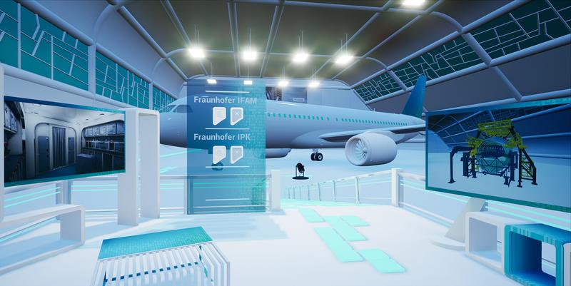 Auf der ILA 2022 per VR-Brille erkundbar: Im virtuellen Flugzeughangar ist rechts der Clean Sky 2 Flugzeugrumpf der Zukunft zu sehen, der aktuell im Fraunhofer IFAM in Stade im 1:1 Maßstab mit Projektpartnern realisiert wird