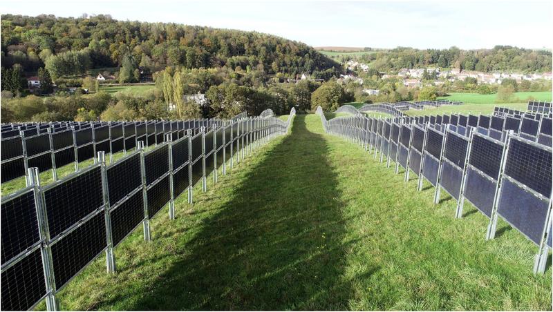 Vertically installed, bifacial solar modules on farmland