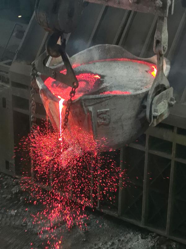 Raw copper smelting in a blast furnace.