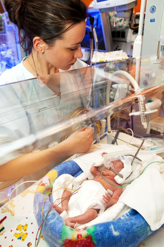 The photo shows a premature infant on a ventilator who is also being treated in the neonatology department.