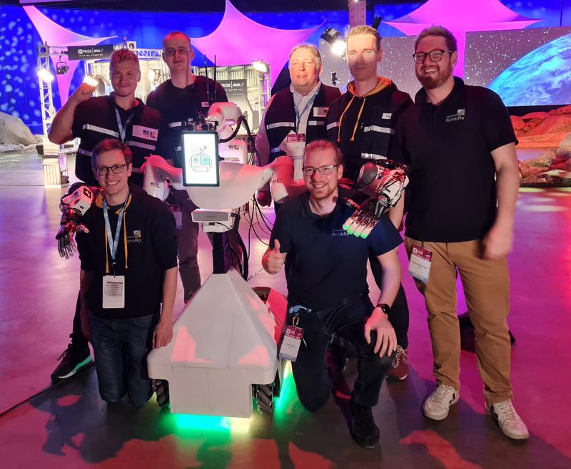 Team NimbRo of the University of Bonn at the finals of the ANA Avatar XPRIZE competition (from left to right, front): Max Schwarz, Christian Lenz; back: Andre Rochow, Bastian Pätzold, Prof. Dr. Sven Behnke, Michael Schreiber and Raphael Memmesheimer. 