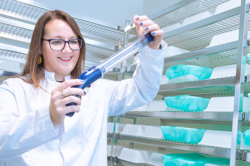 Dr. Victoria Ingham, pictured here with a suction plunger full of Anopheles mosquitoes.