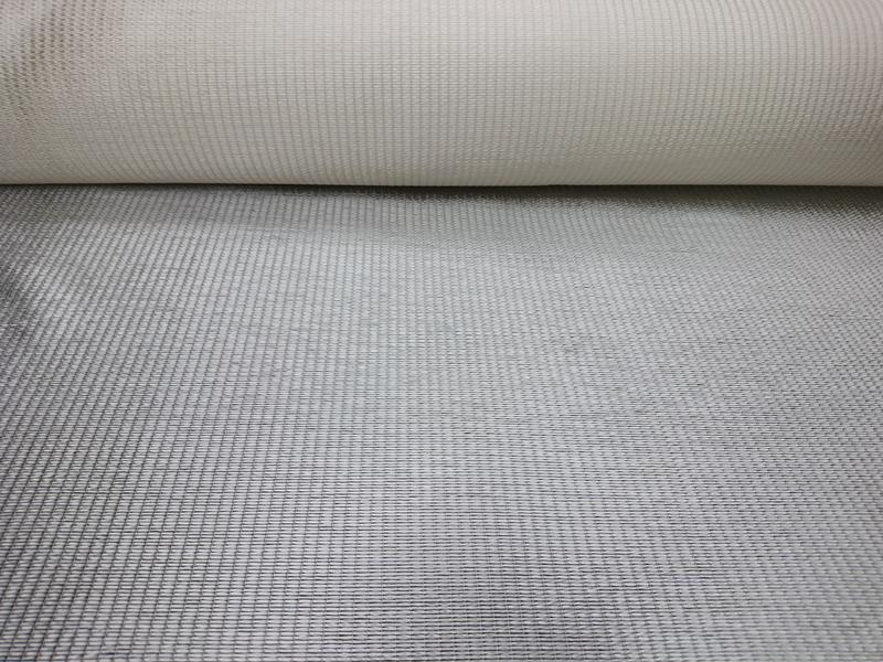 Hybrid textile produced from a hybrid yarn