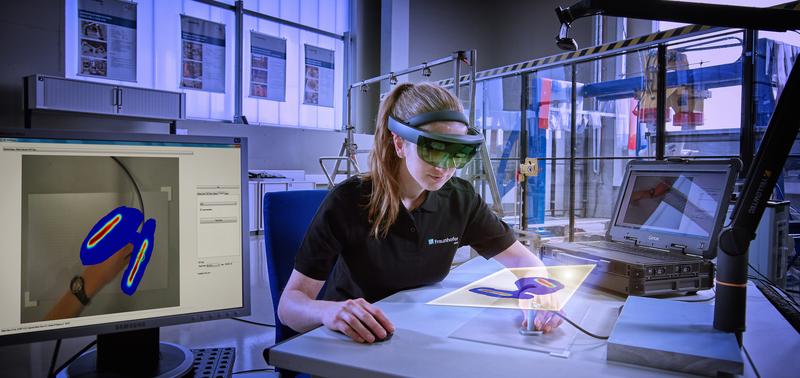 Augmented reality assistance system used to support manual testing of components or large surfaces