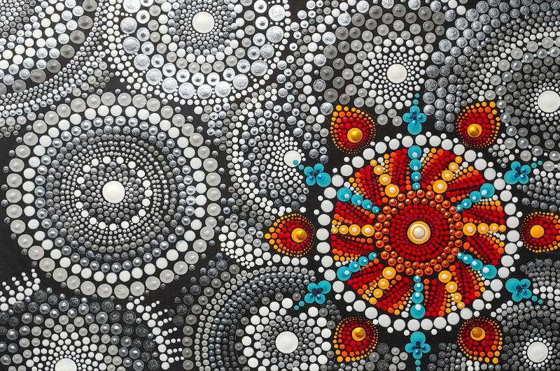 Das Mandala stellt die Forschungsergebnisse künstlerisch dar. Komplette Bildunterschrift siehe Text.