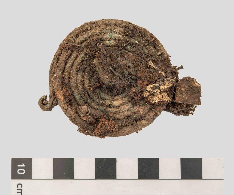 Grave 111: Bronze spiral with textile remains