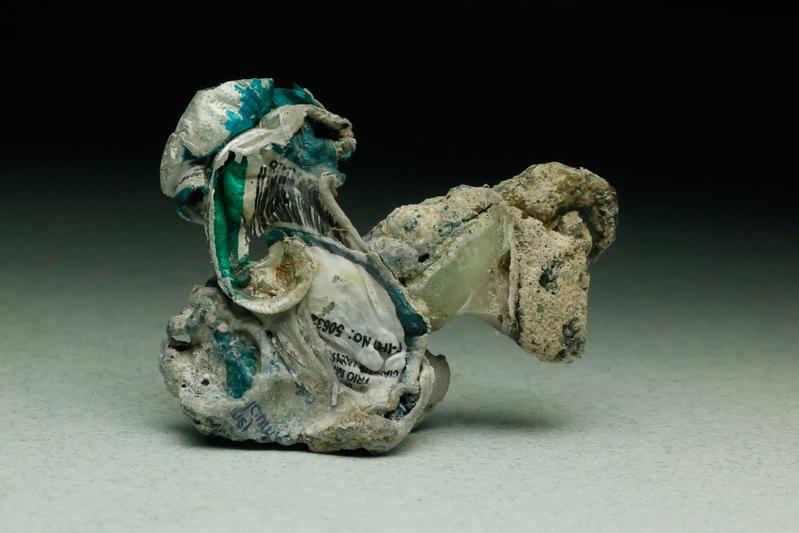 Plastiglomerate of coral rubble held together by melted plastic debris. This artificial "rock" can endanger the environment through greater decomposition into microplastics and higher pollution levels.