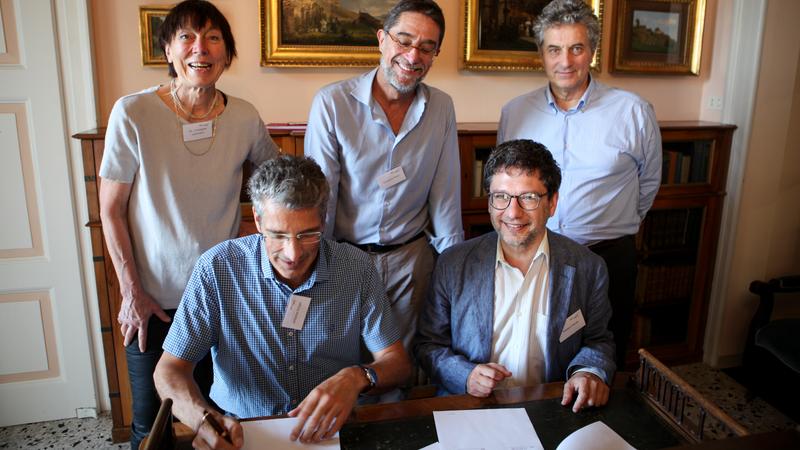 Standing: Christiane Liermann Traniello (General Secretariat of Villa Vigoni), Giovanni Felici (director CNR-Iasi), Vincenzo Fiorentini (Scientific Attaché Italian Embassy Berlin). Seated: Antonio Krüger (CEO DFKI), Matteo Pardo (Cnr, Intern. Rel. Office)