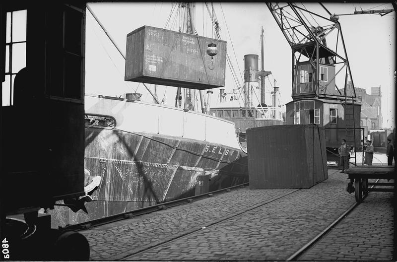 Loading a lift van onto a ship in the Port of Hamburg. 