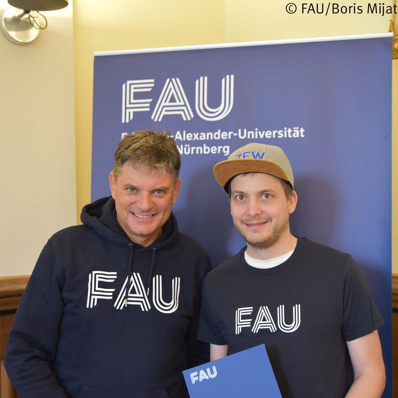Der Präsident der FAU, Prof. Dr. Joachim Hornegger (li.), und Prof. Dr. Simon Reif