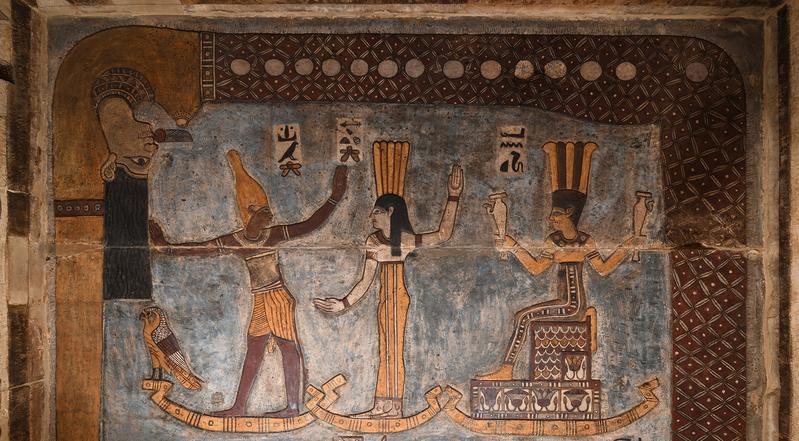 Left to right: Orion, Sothis/Sirius and Anukis, above them the sky goddess Nut swallowing the evening sun. 