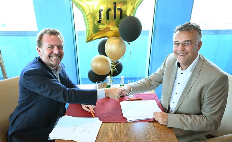 Paul Lovegrove (CEO, University Partnerships Europe)  Dr. Thorsten Bagschik (GF SRH Hochschulen GmbH)