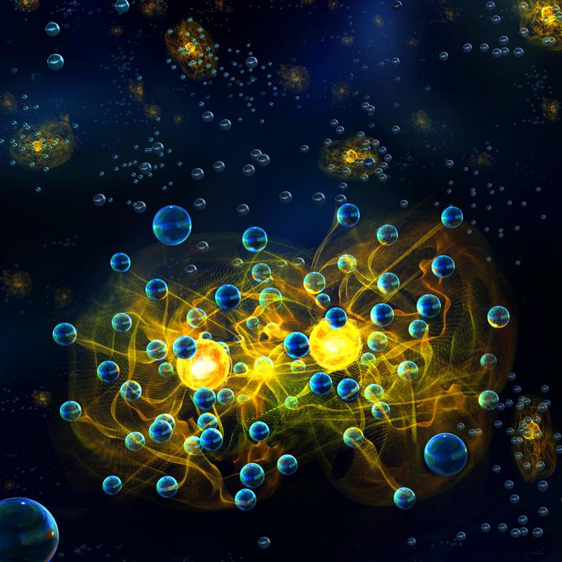 Potassium atoms (yellow) surrounded by lithium atoms (blue) form polarons that interact with each other