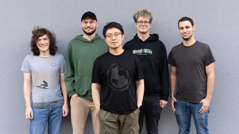 Riuyi Zhang (center) was supported in the discovery of CacheWarp by his team (pictured here), Andreas Kogler from TU Graz and CISPA faculty member Dr. Michael Schwarz (far right).