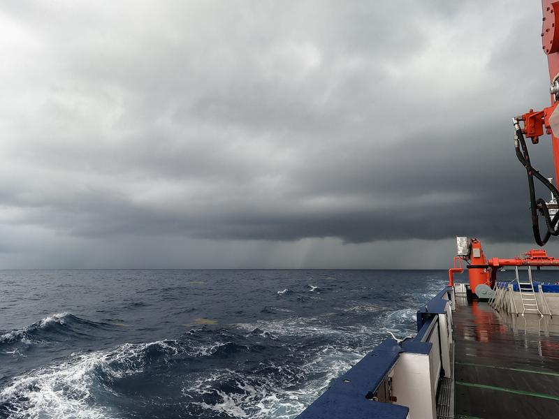 Extreme rainfall, like the one photographed here during the measuring mission “Mooring Rescue“ in the Atlantic ocean, will become more intense when global temperatures rise, the authors of the paper find. 