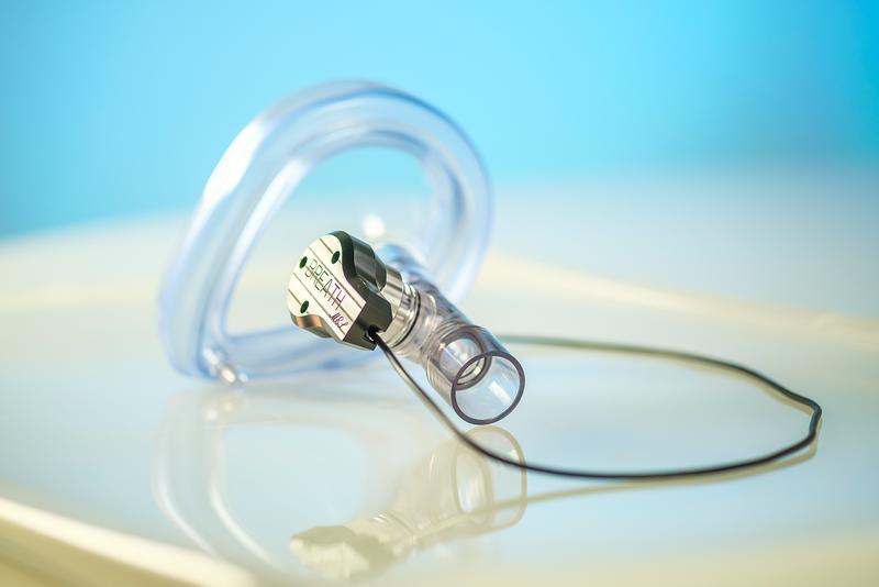 The noninvasive miniature sensor can be incorporated into existing ventilation equipment via a T-connector.