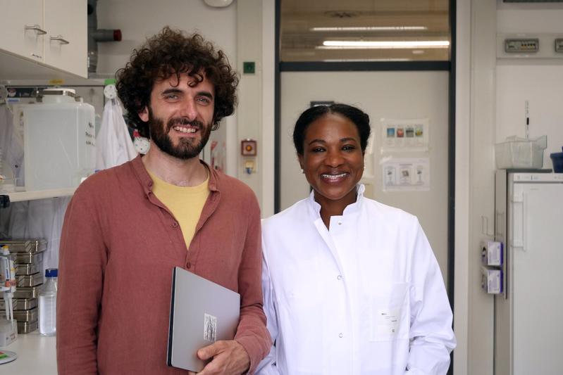 Marco Galardini (lerft) and Maureen Obara in the lab. 