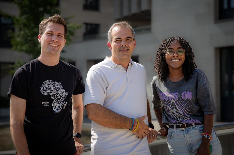 From Imbizo in South Africa to ISTA in Austria. Postdoc Christopher Currin from South Africa, ISTA Professor Tim Vogels from Germany, and scientific intern Hager Ali from Sudan.