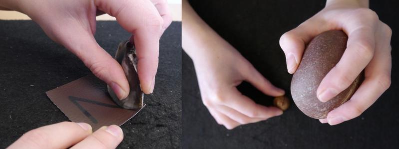 A researcher demonstrates which tasks the participants were asked to perform during the experiment – here in the planning phase: on the left, making precise cuts in leather; on the right, cracking nuts using stone tools.