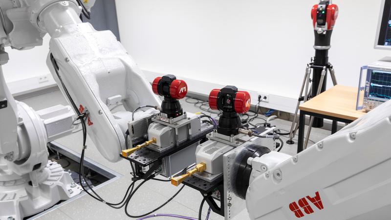 Robot-assisted THz laboratory for micrometre-precise material measurement and localization