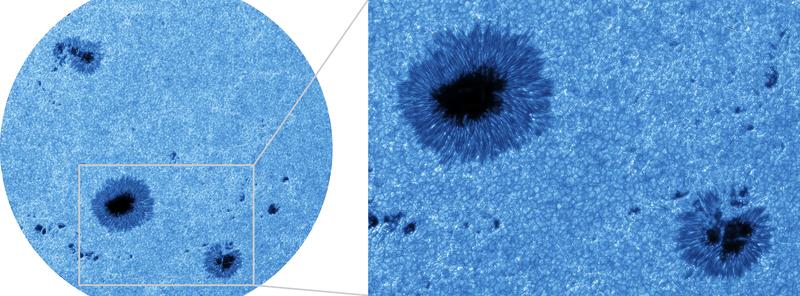 Restored short-exposure G-band image of simple sunspots and pores in the active regions NOAA 13685 and NOAA 13686 taken with the VTT on 2024 May 24. The coloring corresponds to the observed wavelength at 430.7 nm.
