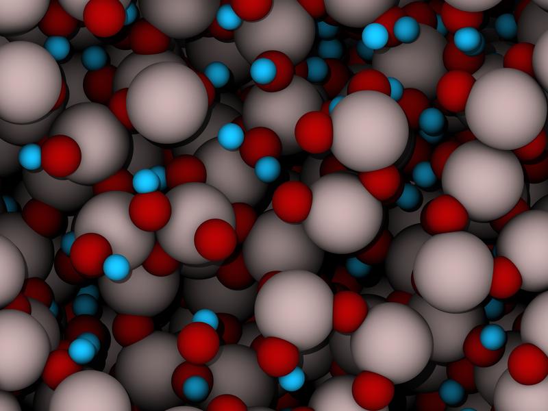 Klarheit aus dem Chaos: Die Aluminium-Atome (grau) und die Sauerstoffatome (rot) liegen im amorphen Aluminiumoxid nicht in einer geordneten kristallinen Form vor. Das Modell zeigt ausserdem eingelagerte Wasserstoffatome (blau).