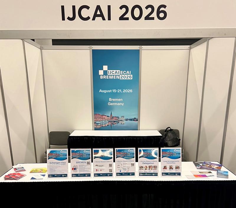Vertreter:innen aus Bremen präsentierten sich mit einem eigenen Informationsstand bei der IJCAI 2025 in Montréal.