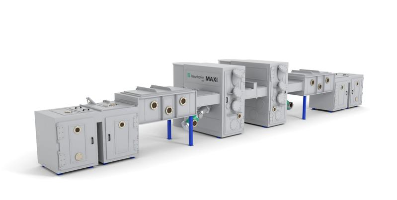 In-line vacuum coating system for sheets and metal strips "MAXI"