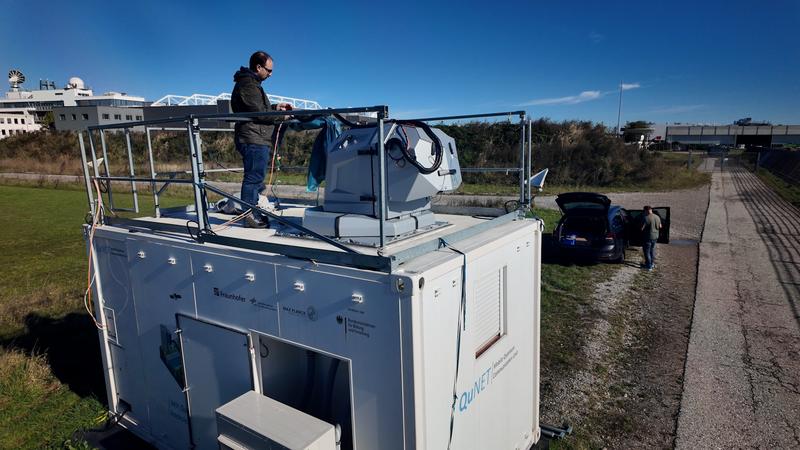 The QuBUS, a mobile container, is the optical ground station for receiving the signals.