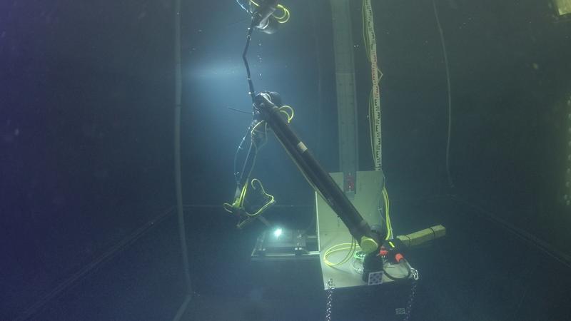 The MARIOW robot performing autonomous welding of a fillet weld underwater.
