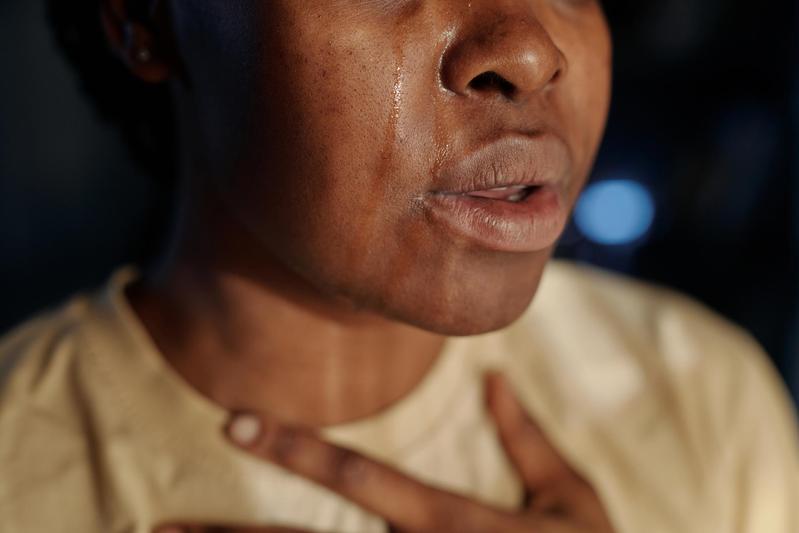 Young woman crying: In the wake of political unrest, young people in Africa are experiencing more domestic and other violence.  
