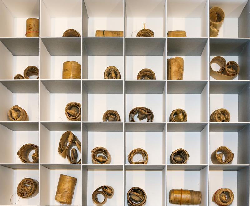 Palm leaf documents in a conservation box