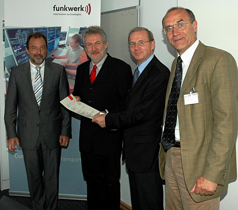 v.l.n.r.: Reinhold Hundt, Prof. Dr.-Ing. Norbert Luttenberger, Minister Dietrich Austermann und Prof. Dr. Hans-Jürgen Block